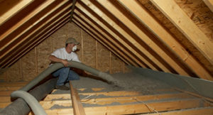 Dry loose-fill blow in cellulose insulation decreases the amount of energy required to heat a space. Photo Credit: Energy.gov